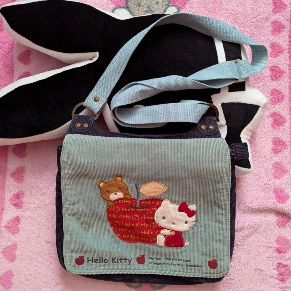 hello kitty green ish purse